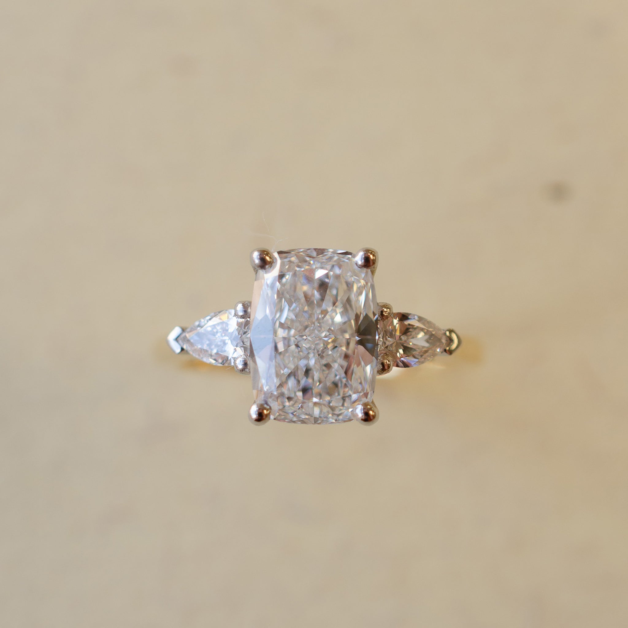 Cushion Cut & Pear Shape Diamond Trilogy Engagement Ring