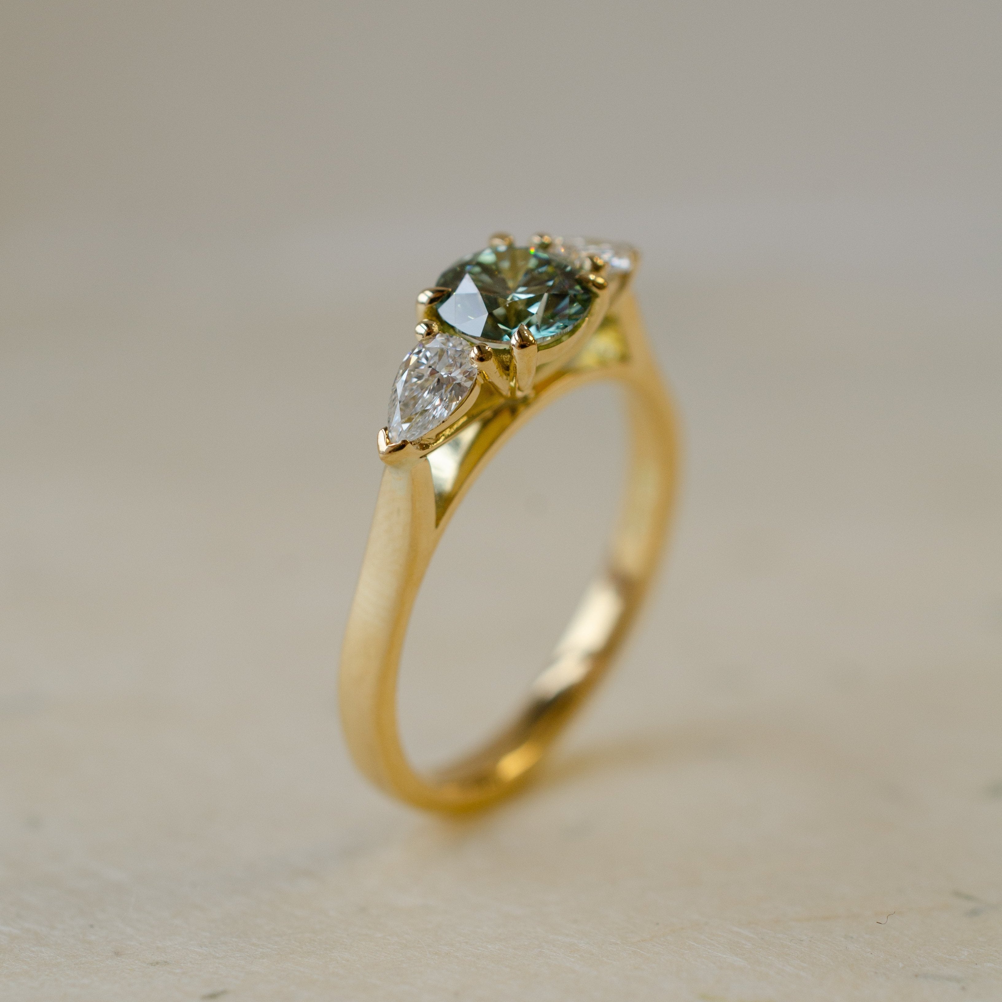 Blue Diamond Trilogy Engagement Ring