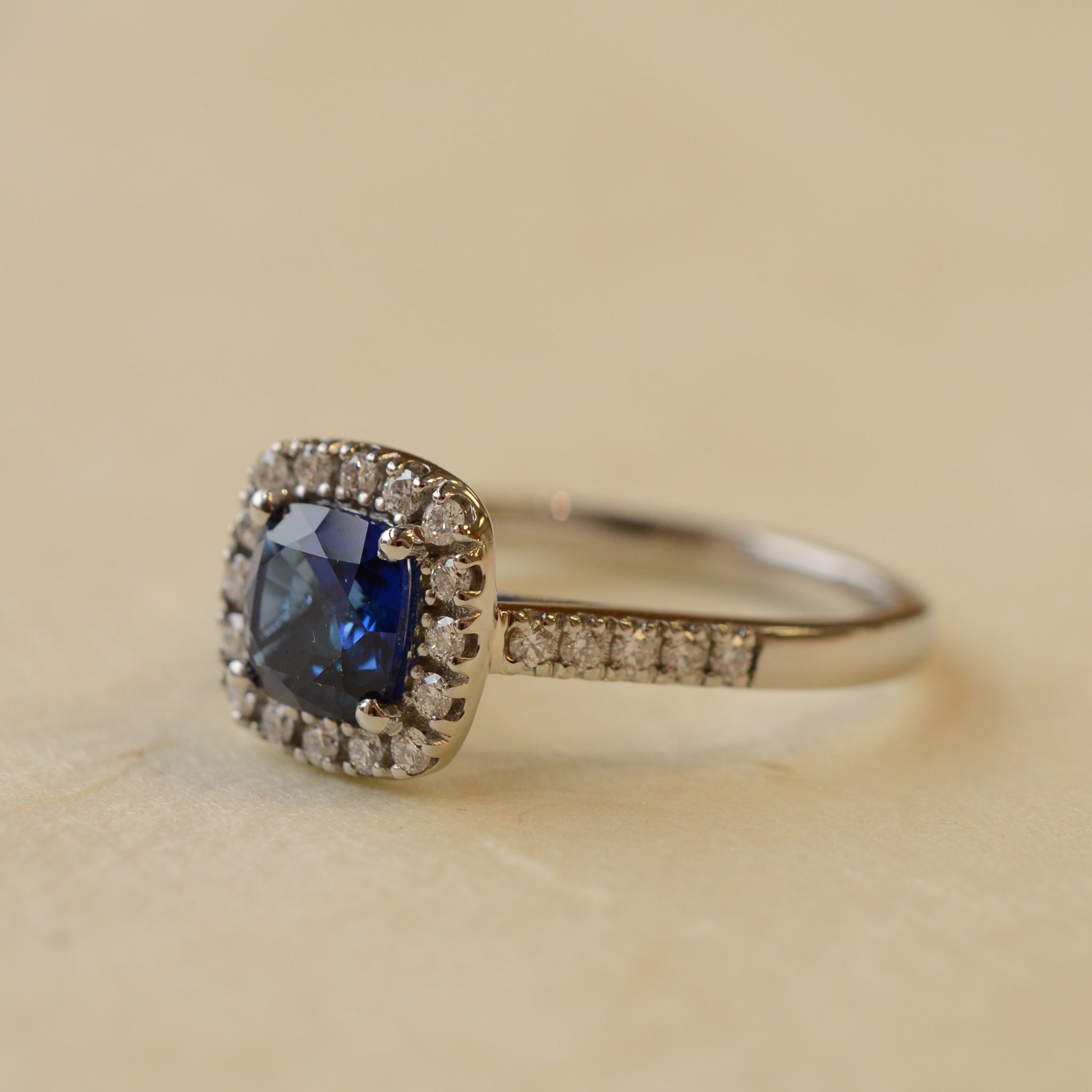 Cushion Cut Blue Sapphire With Diamond Set Halo