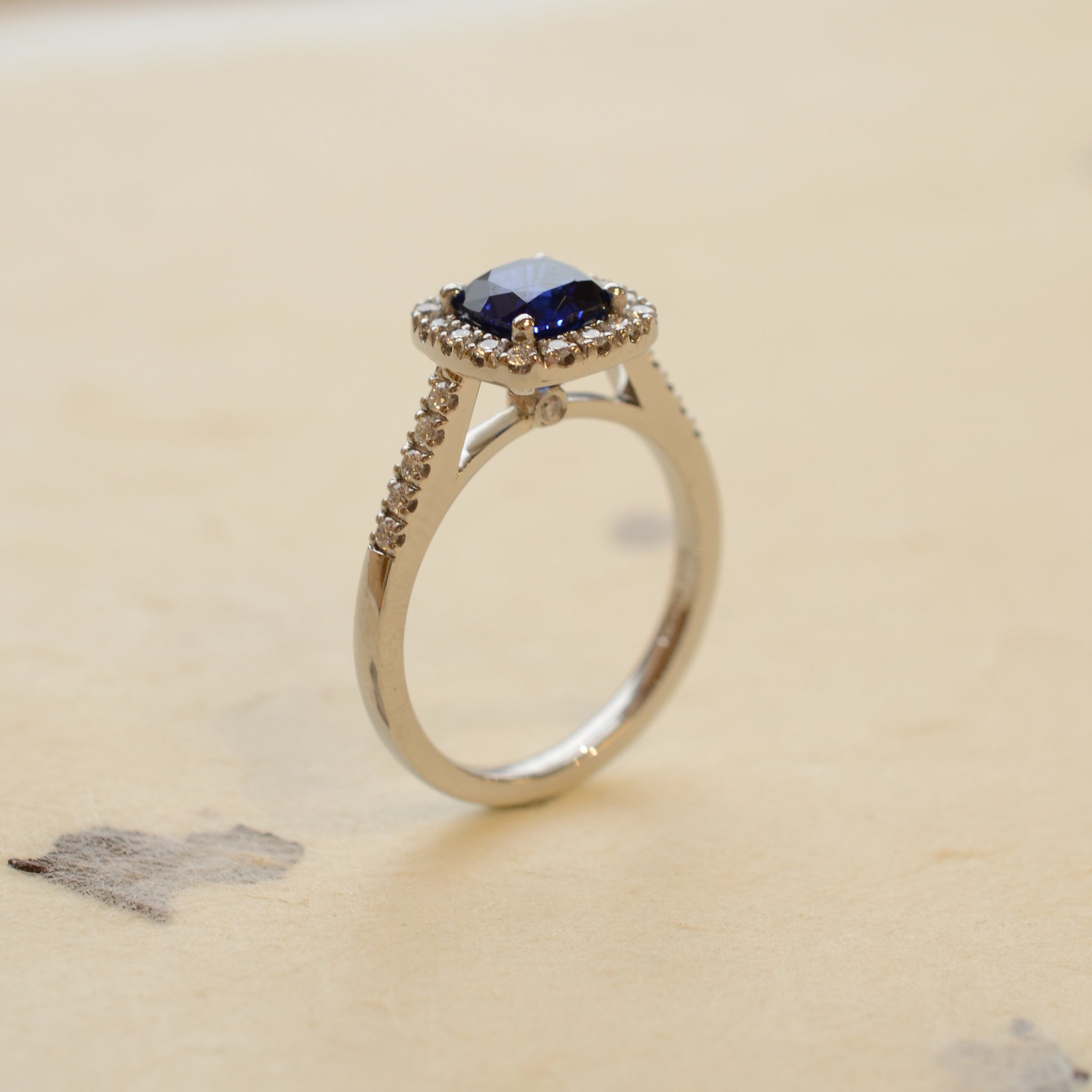 Cushion Cut Blue Sapphire With Diamond Set Halo