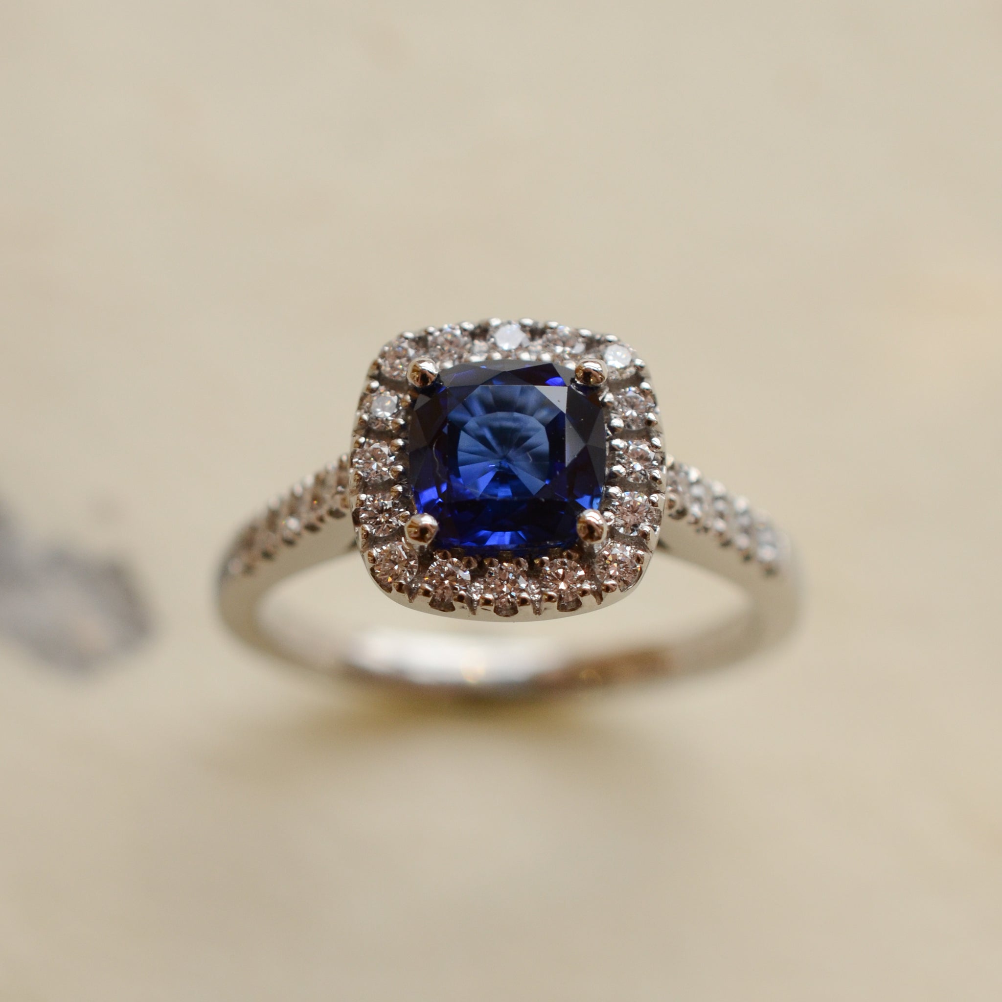 Cushion Cut Blue Sapphire With Diamond Set Halo