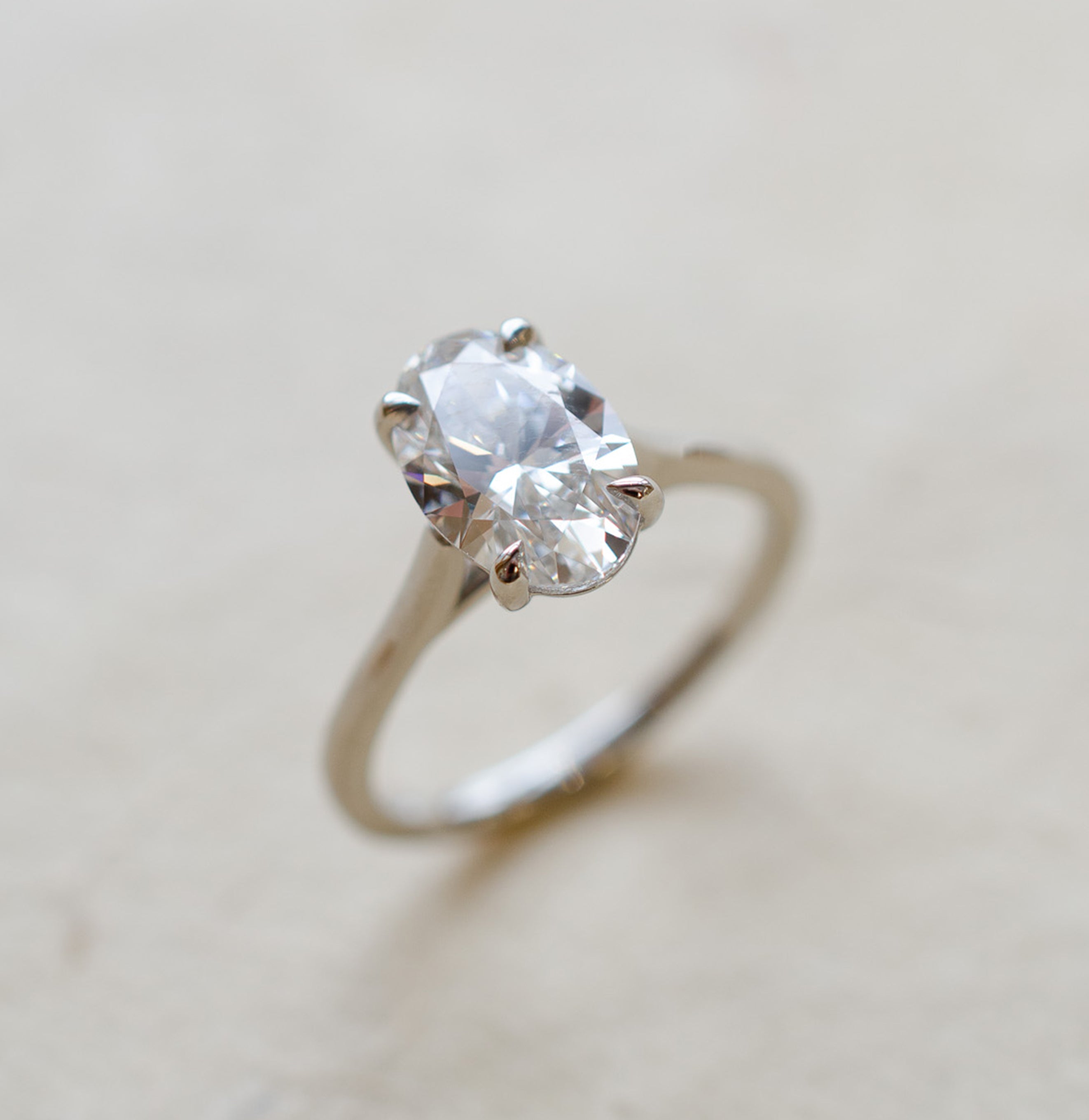 Oval Diamond Solitaire Engagement Ring In Platinum