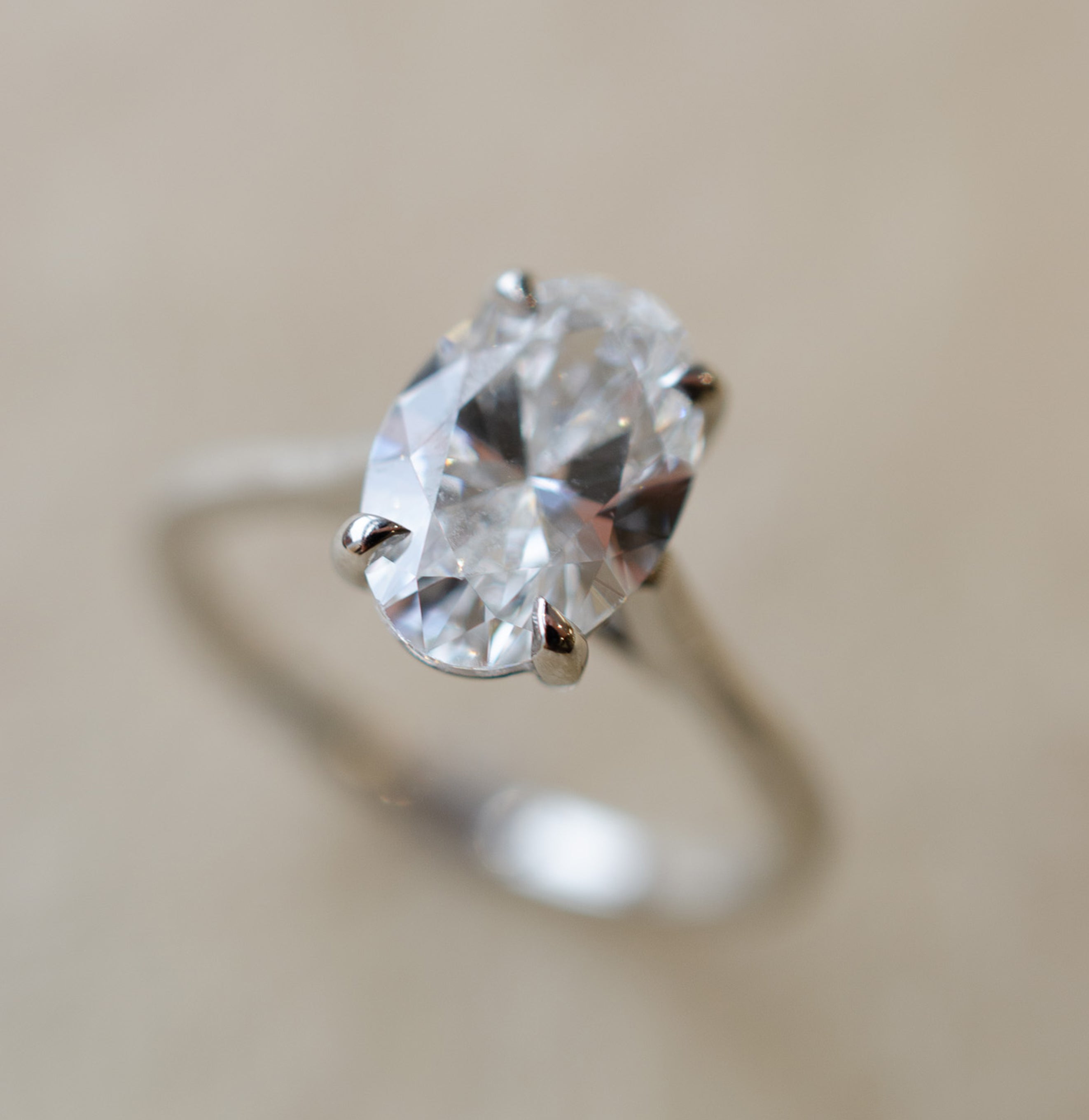 Oval Diamond Solitaire Engagement Ring In Platinum