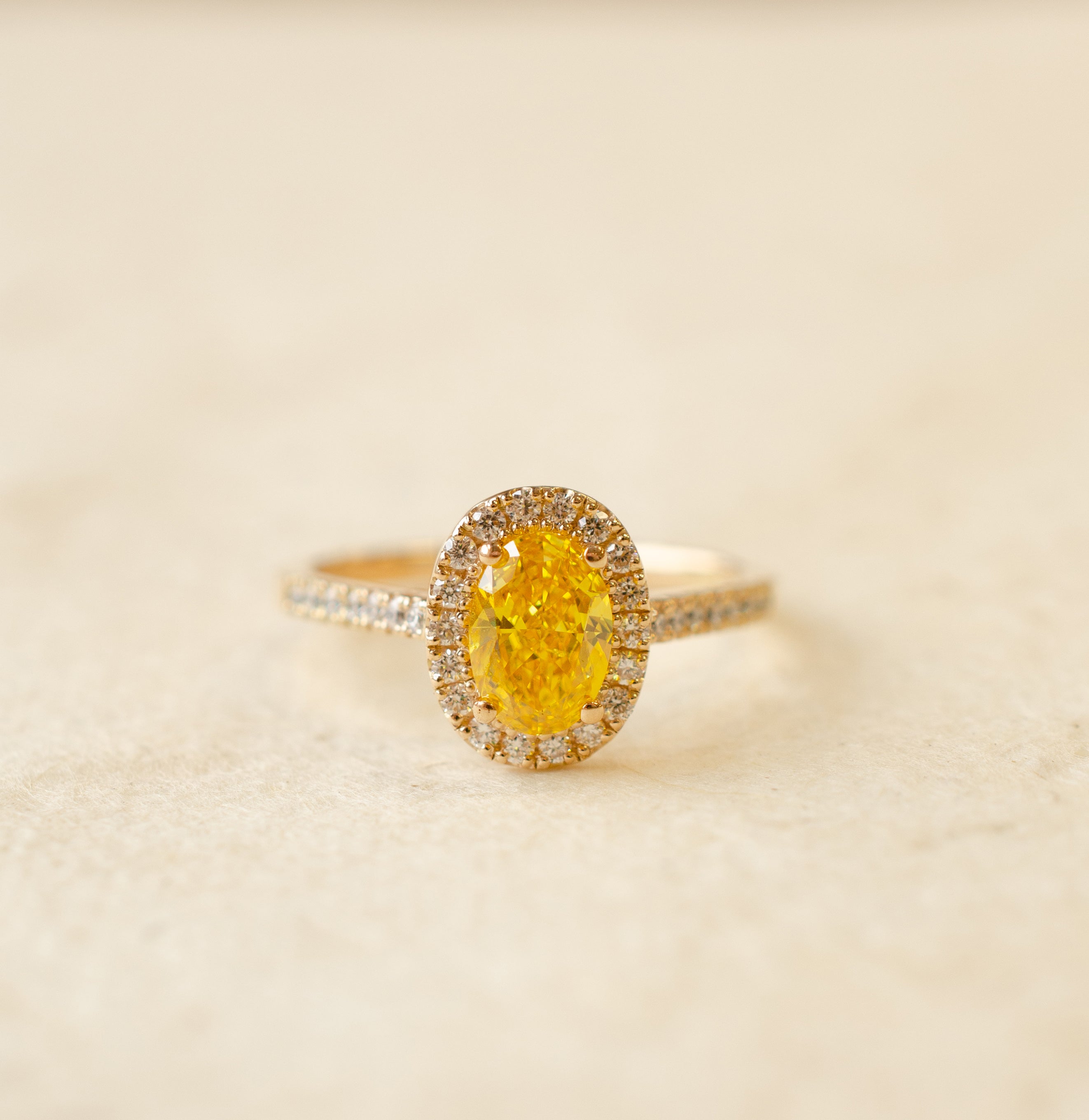 Yellow Oval Diamond Halo Engagement Ring
