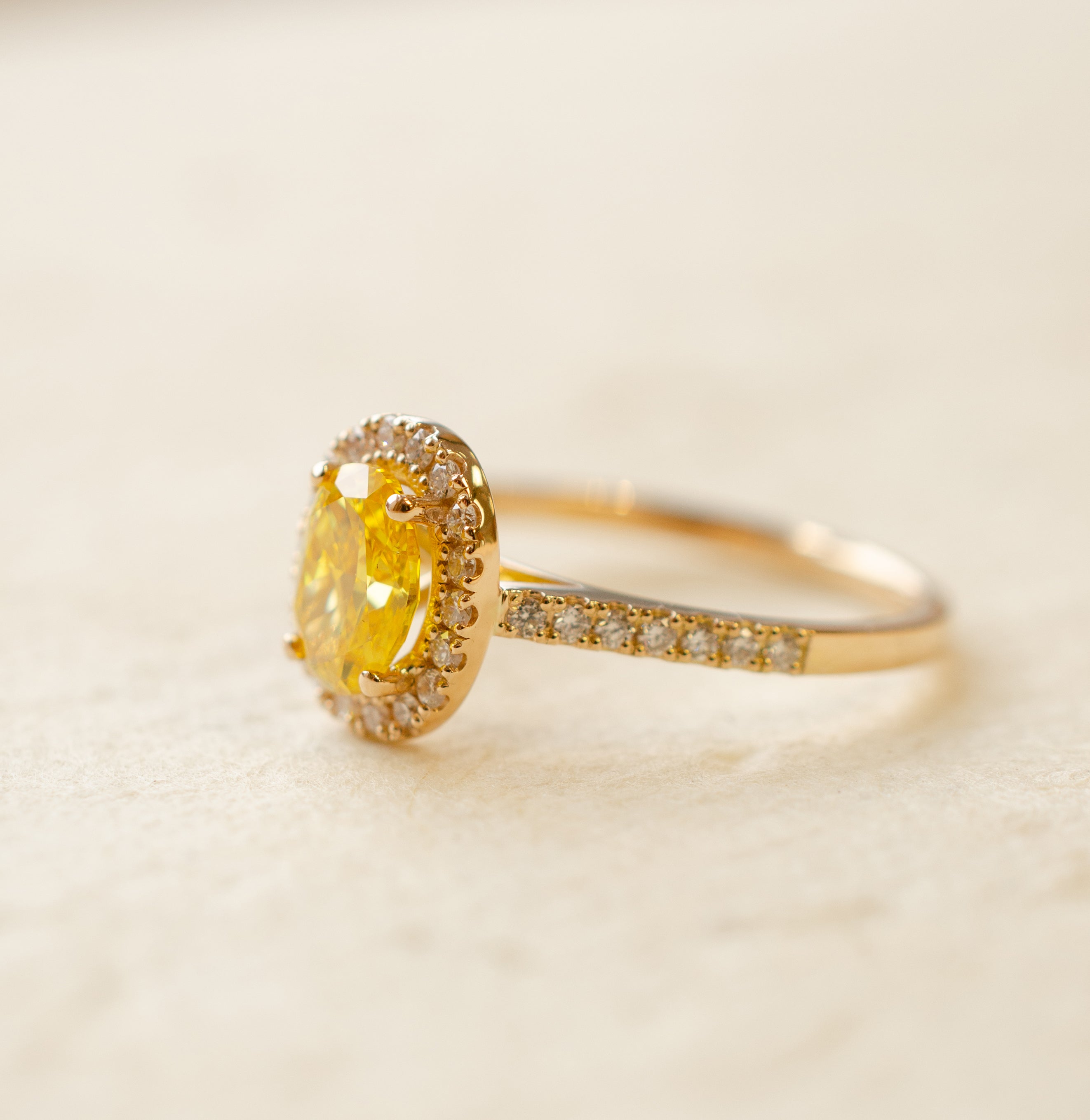 Yellow Oval Diamond Halo Engagement Ring