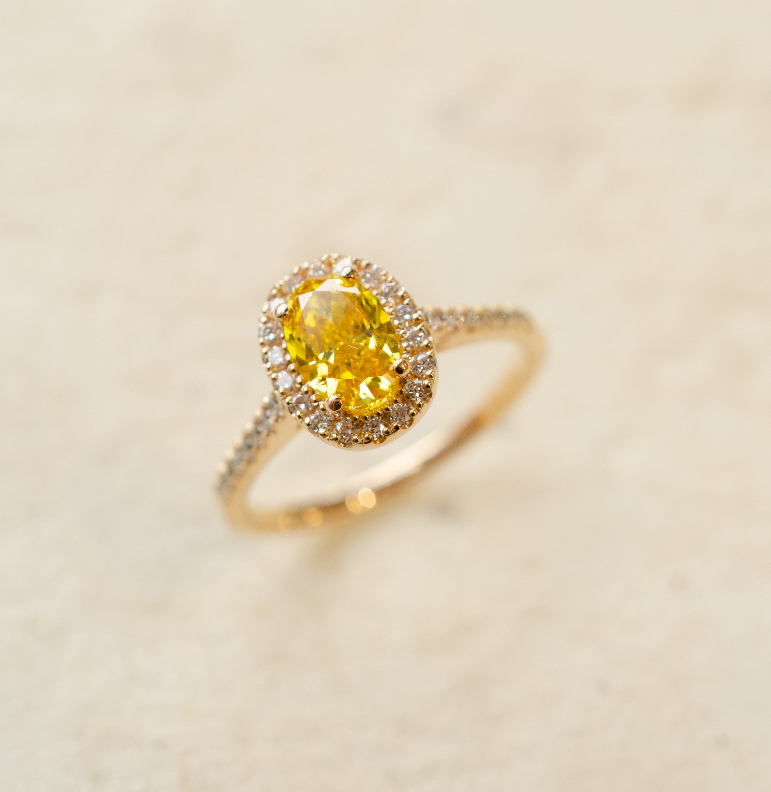 Yellow Oval Diamond Halo Engagement Ring