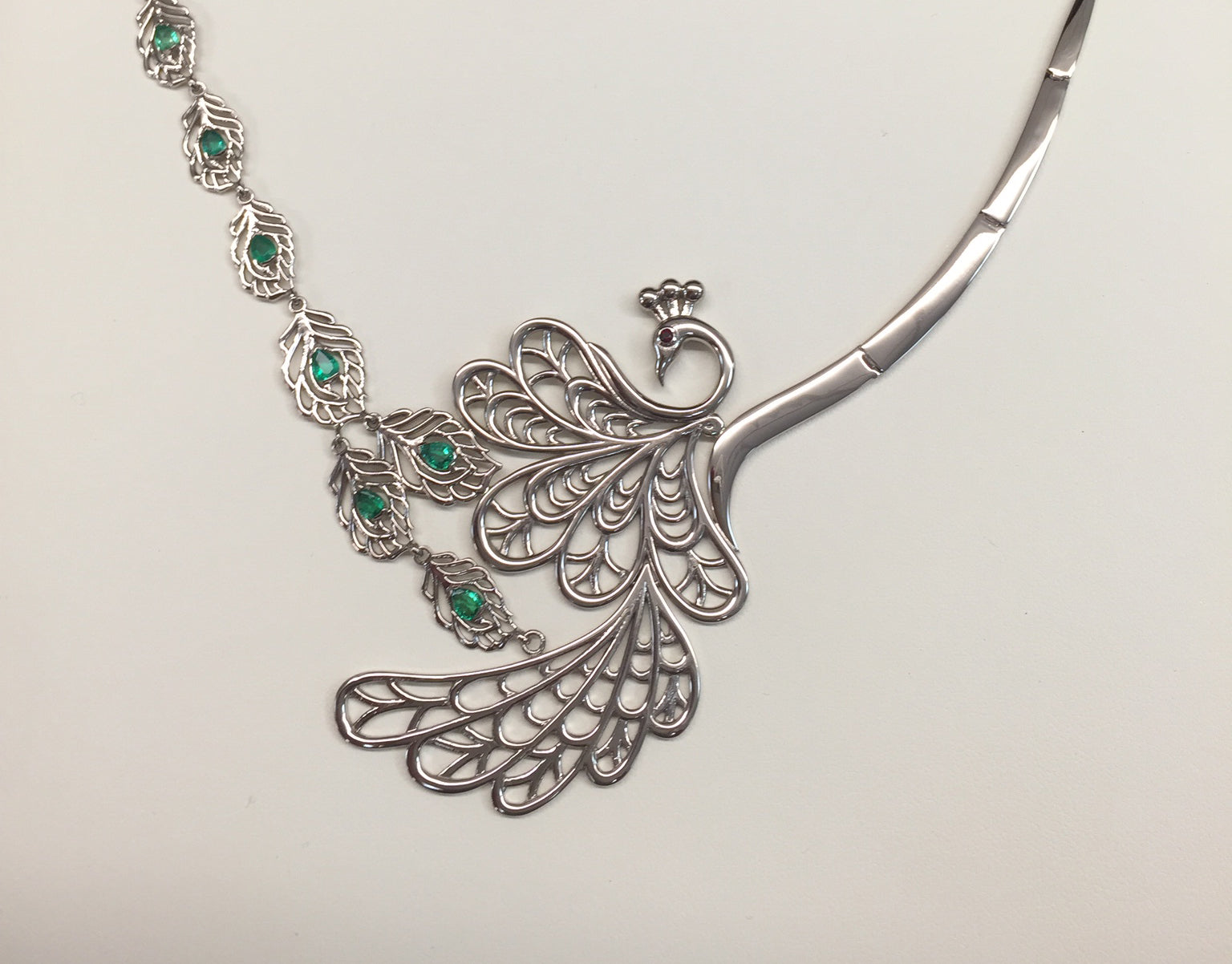 Bespoke White Gold Peacock Necklace with Emeralds