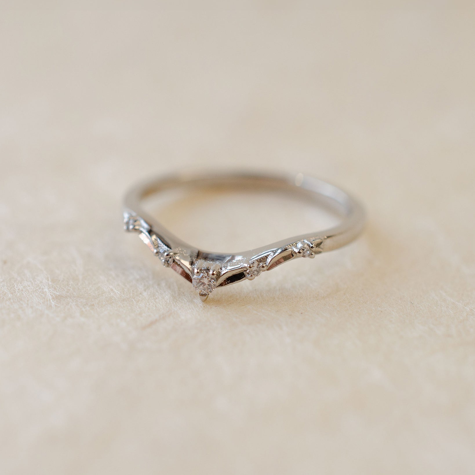 Platinum fitted wedding band with diamonds