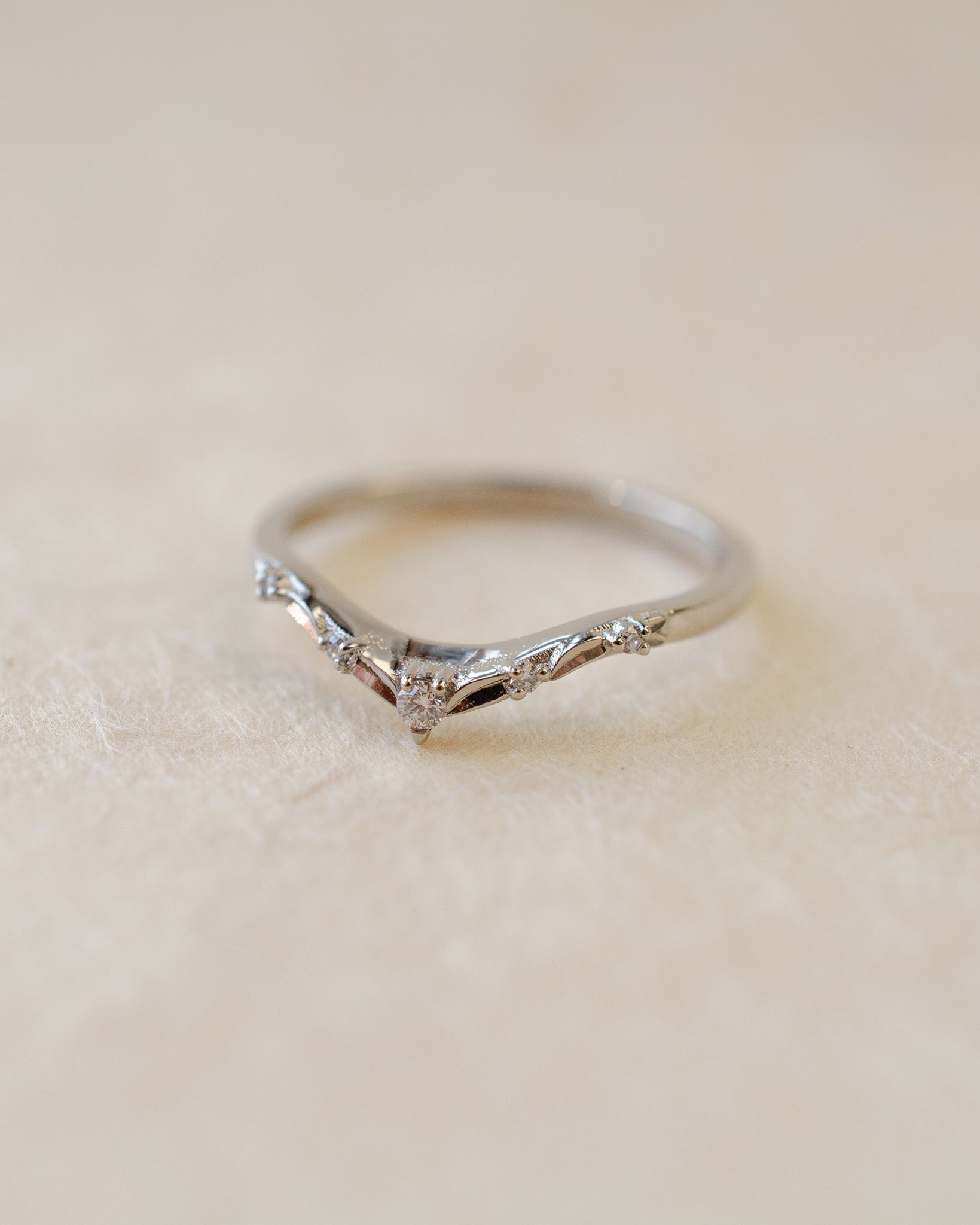 Platinum fitted wedding band with diamonds