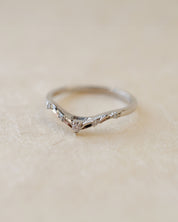 Platinum fitted wedding band with diamonds