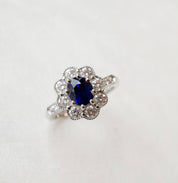 natural oval cut blue sapphire and diamond ring