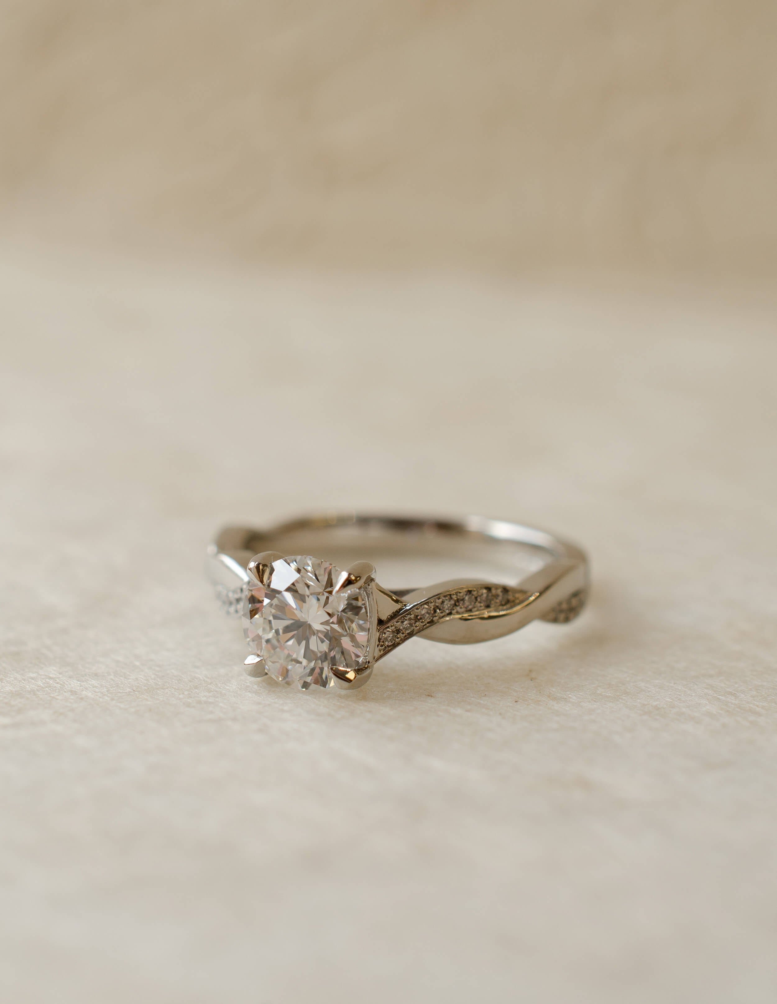 diamond solitaire engagement with with twisted shoulders