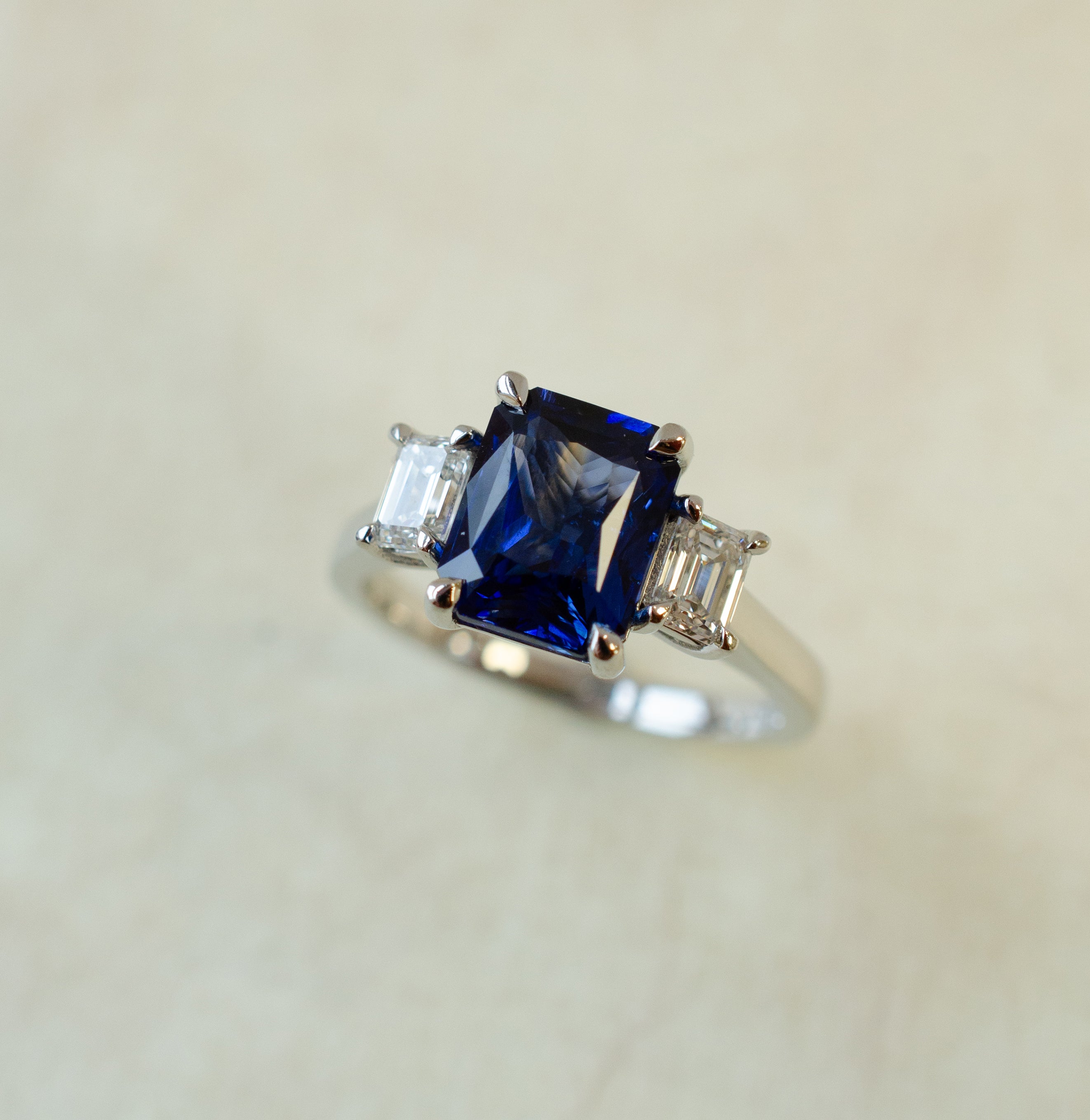 Emerald Cut Sapphire Trilogy Engagement Ring