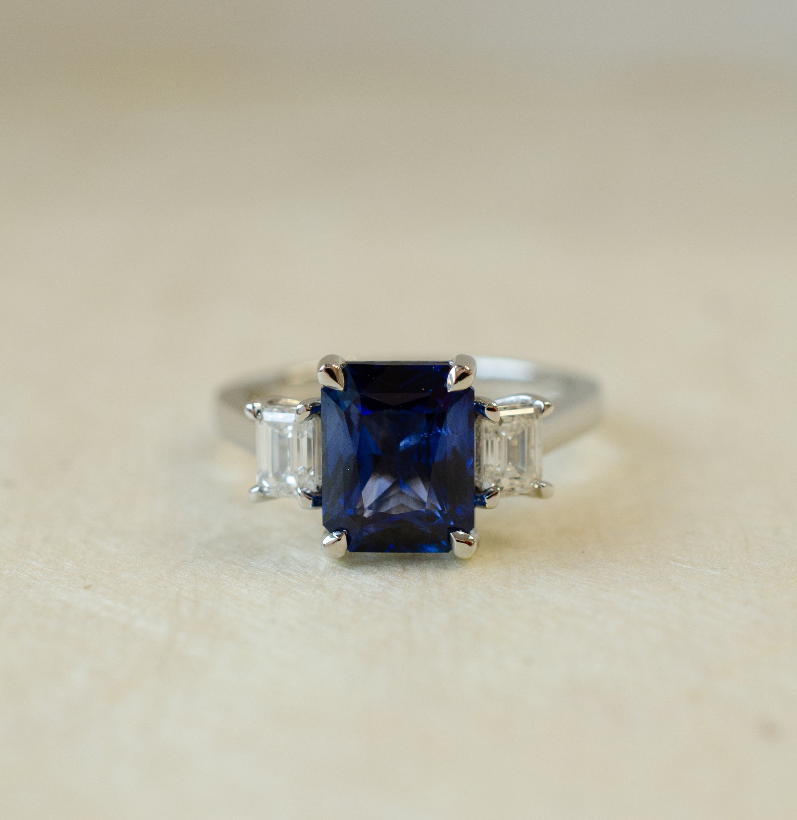 Emerald Cut Sapphire Trilogy Engagement Ring