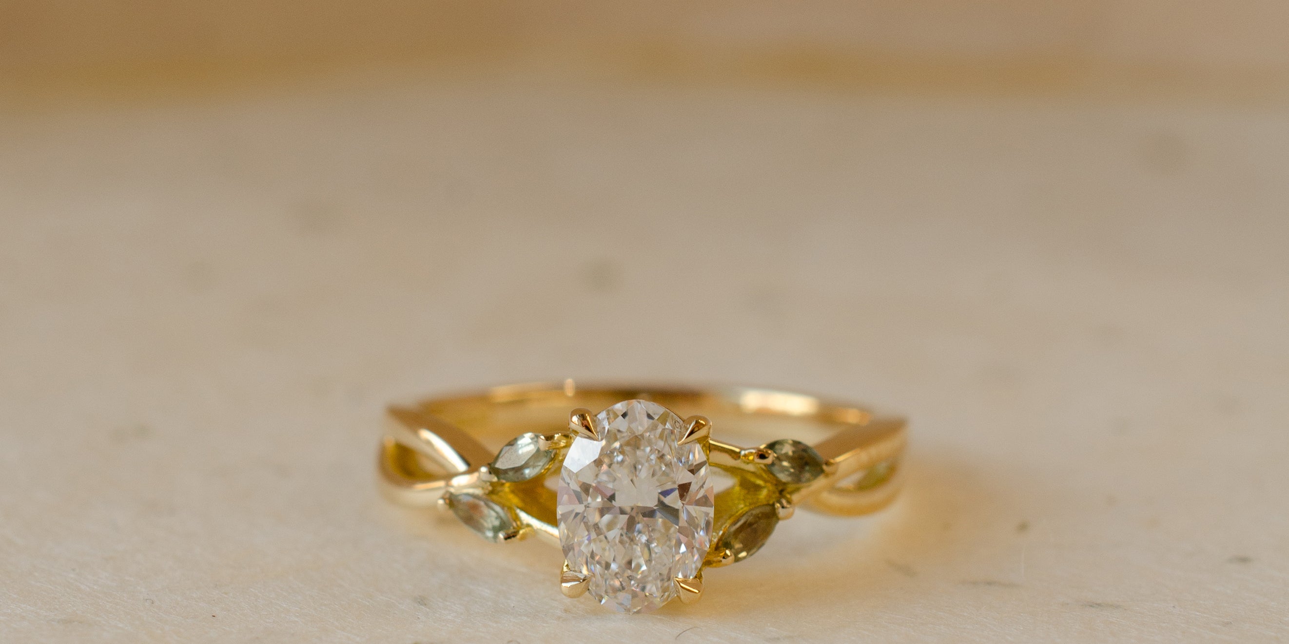 Oval Diamond & Green Sapphire Engagement Ring