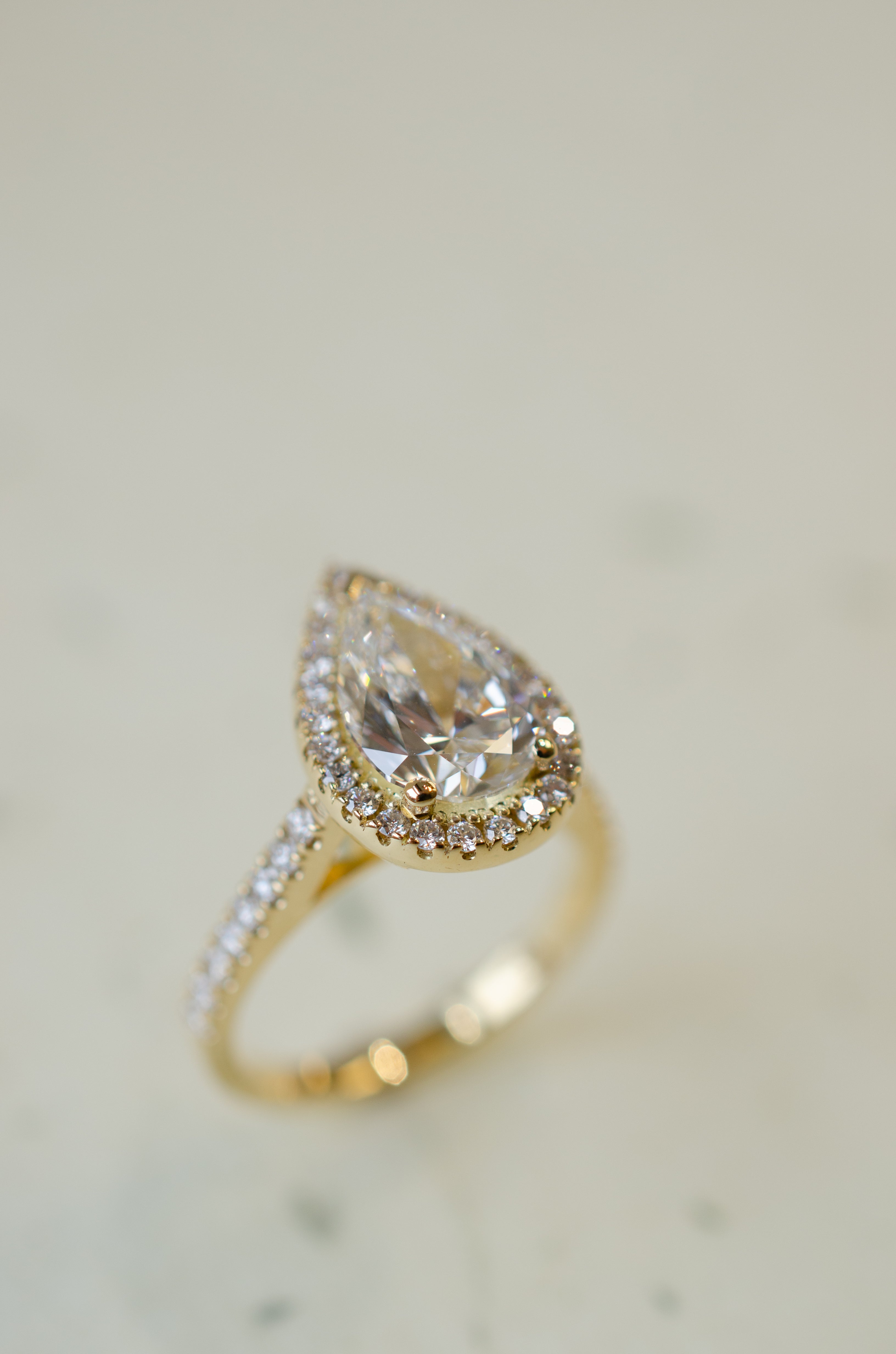Lab grown diamond pear shape halo engagement ring