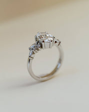 An oval white diamond engagement ring in platinum