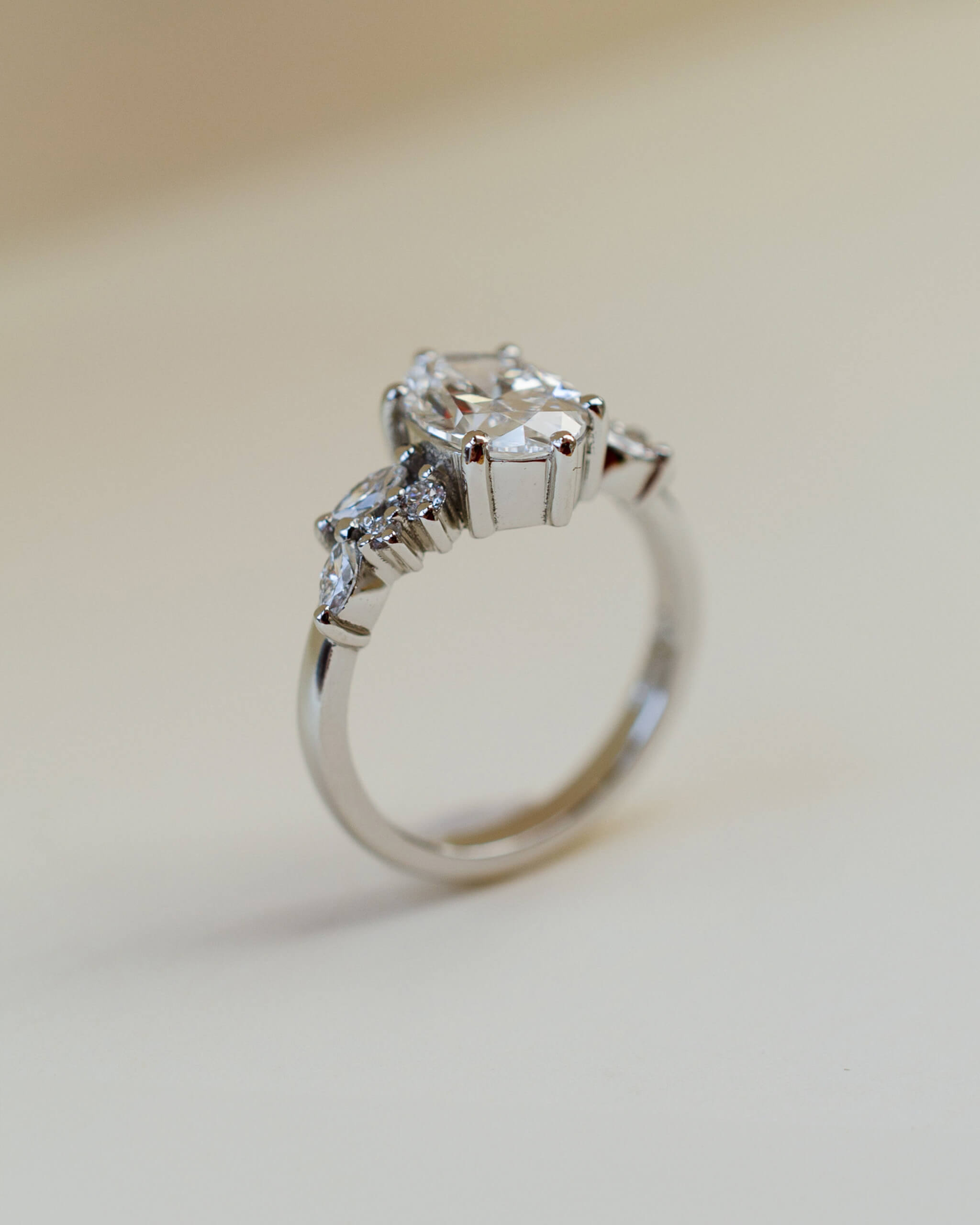 An oval white diamond engagement ring in platinum