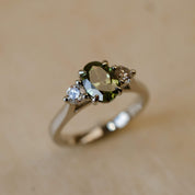 Lab grown green diamond trilogy ring in platinum
