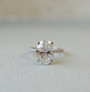 Oval Diamond Solitaire Ring With Collar Halo