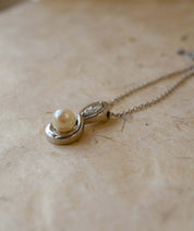 platinum diamond and pearl infinity pendant 