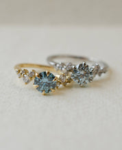 Blue diamond engagement ring with scatter diamond shoulders