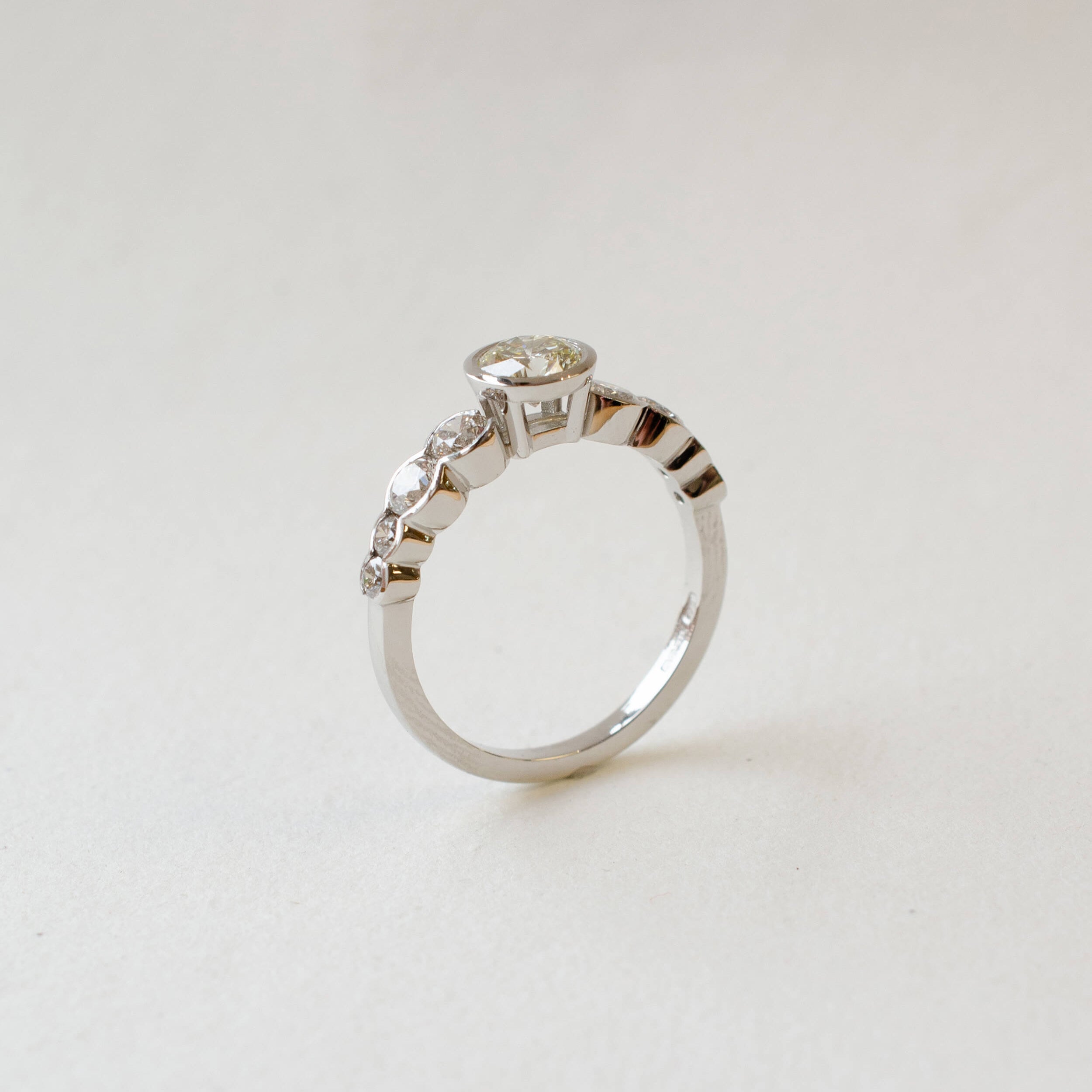 Platinum and diamond nine stone ring