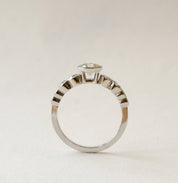 Nine diamond engagement ring