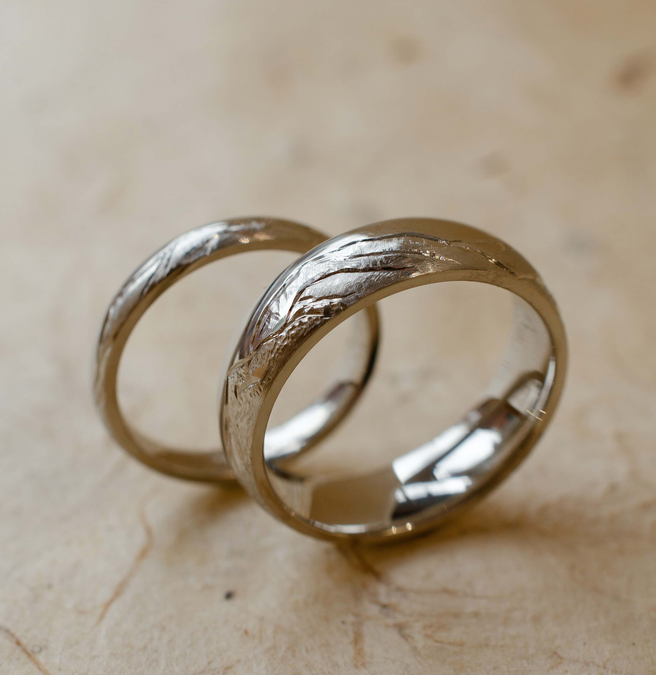 Platinum wedding band engraved with mountain landscape