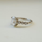 Platinum and diamond oval cut engagement ring