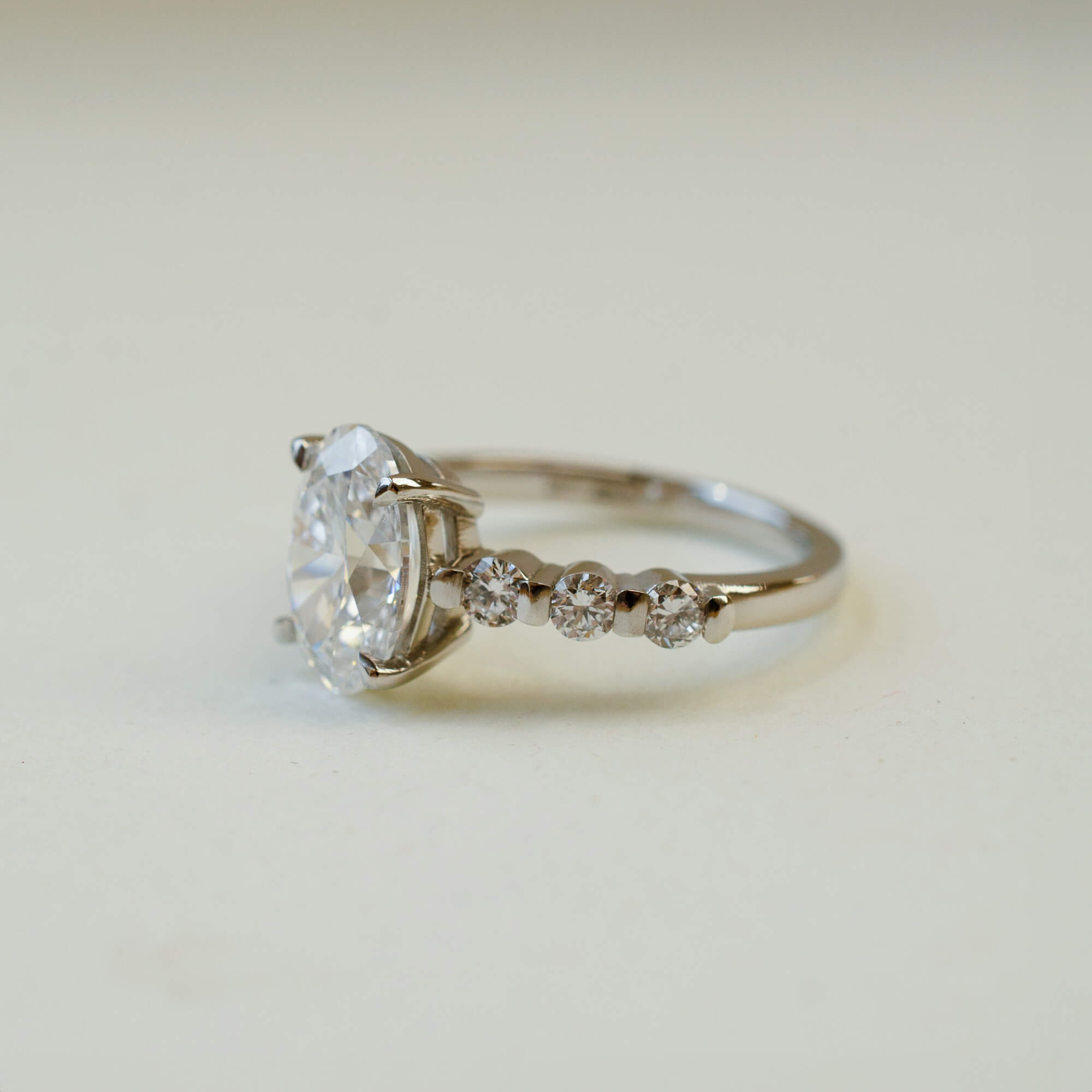 Platinum and diamond oval cut engagement ring