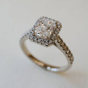 Platinum and diamond radiant cut halo style ring