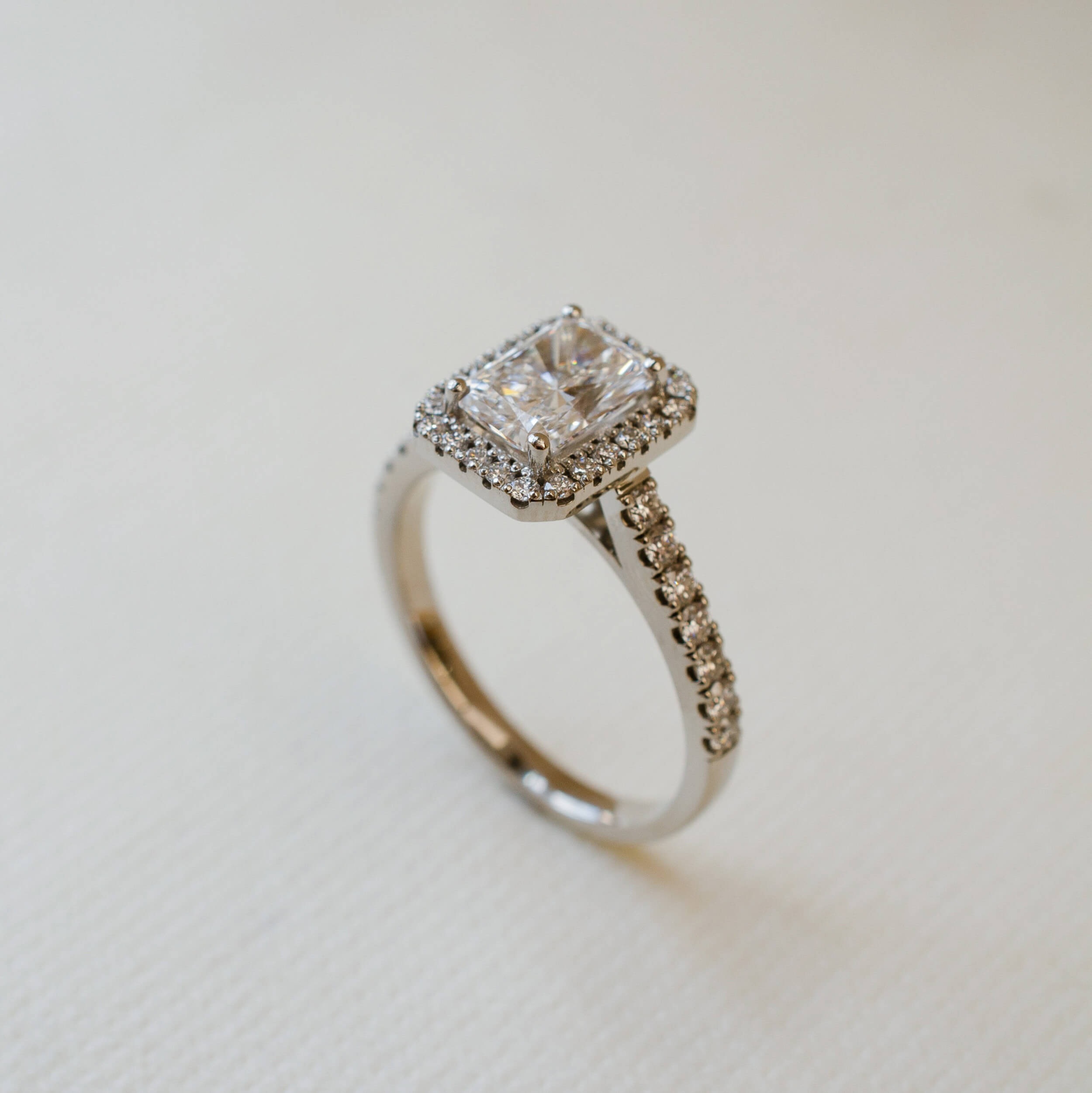 diamond halo ring with radiant cut stone