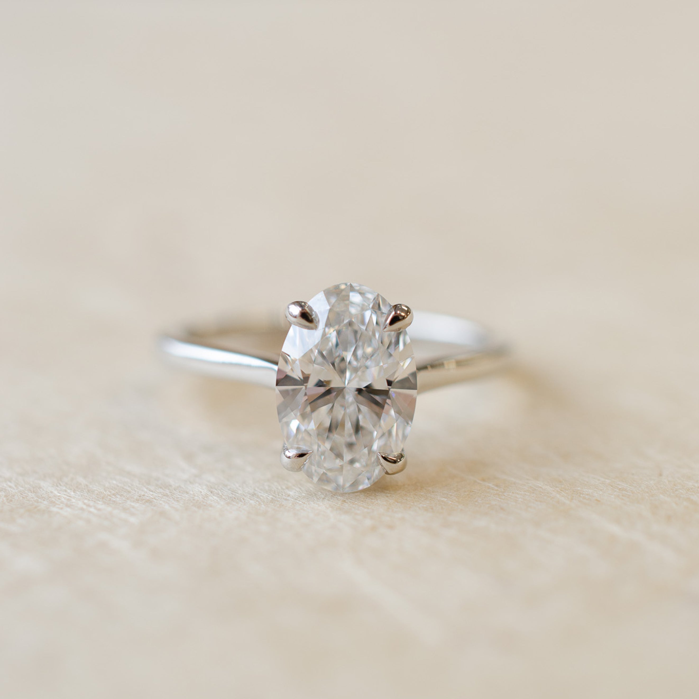 Oval Diamond Solitaire Engagement Ring In Platinum