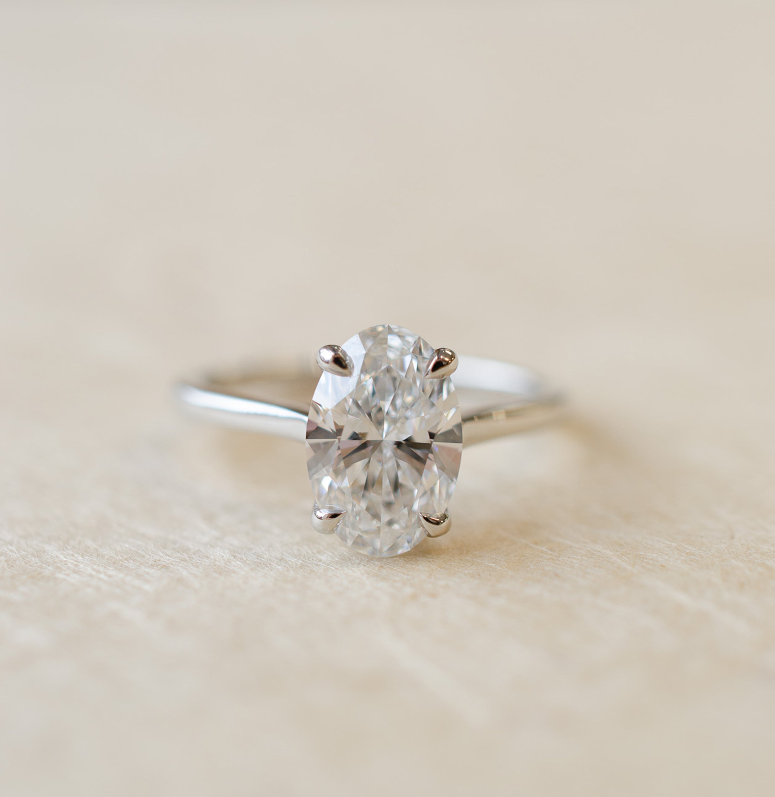 Oval Diamond Solitaire Engagement Ring In Platinum