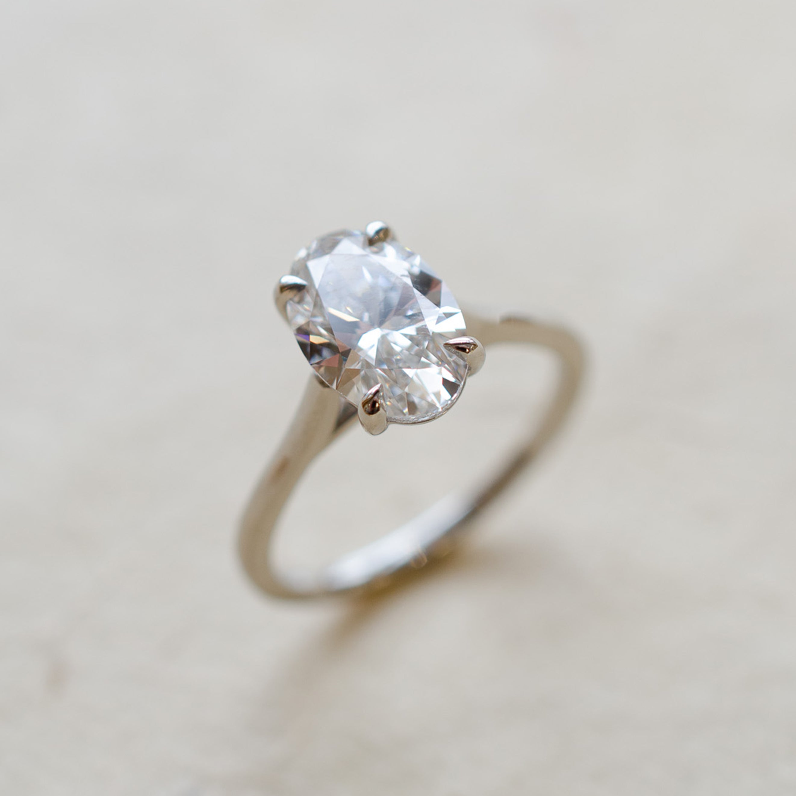 Oval Diamond Solitaire Engagement Ring In Platinum
