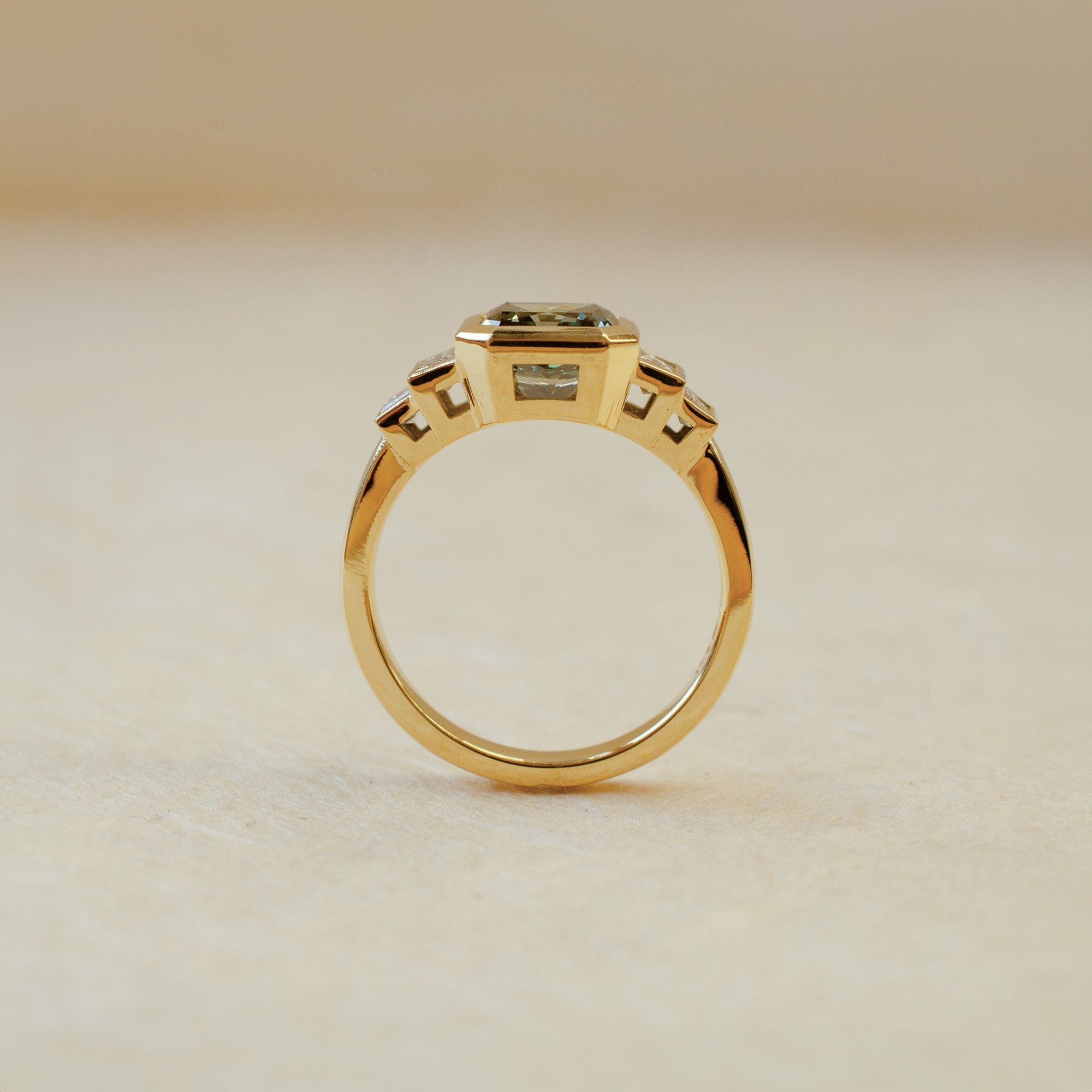 yellow gold art deco style teal lab grown diamond ring