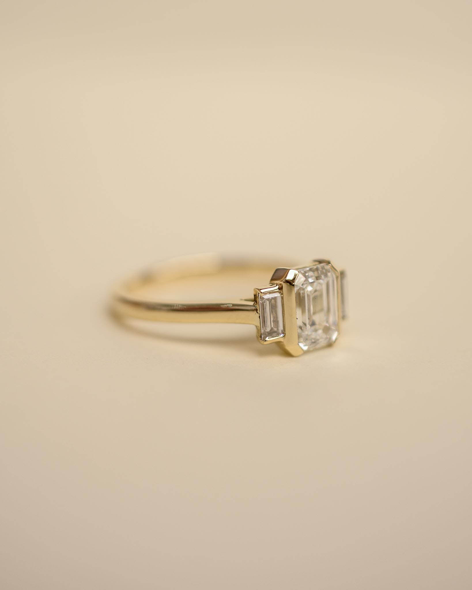 Yellow Gold Emerald Cut and Baguette Trilogy Engagement Ring