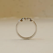 platinum shaped wedding ring with marquise diamonds and sapphires 