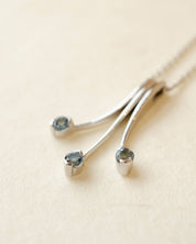 Platinum necklace with aquamarine gemstones