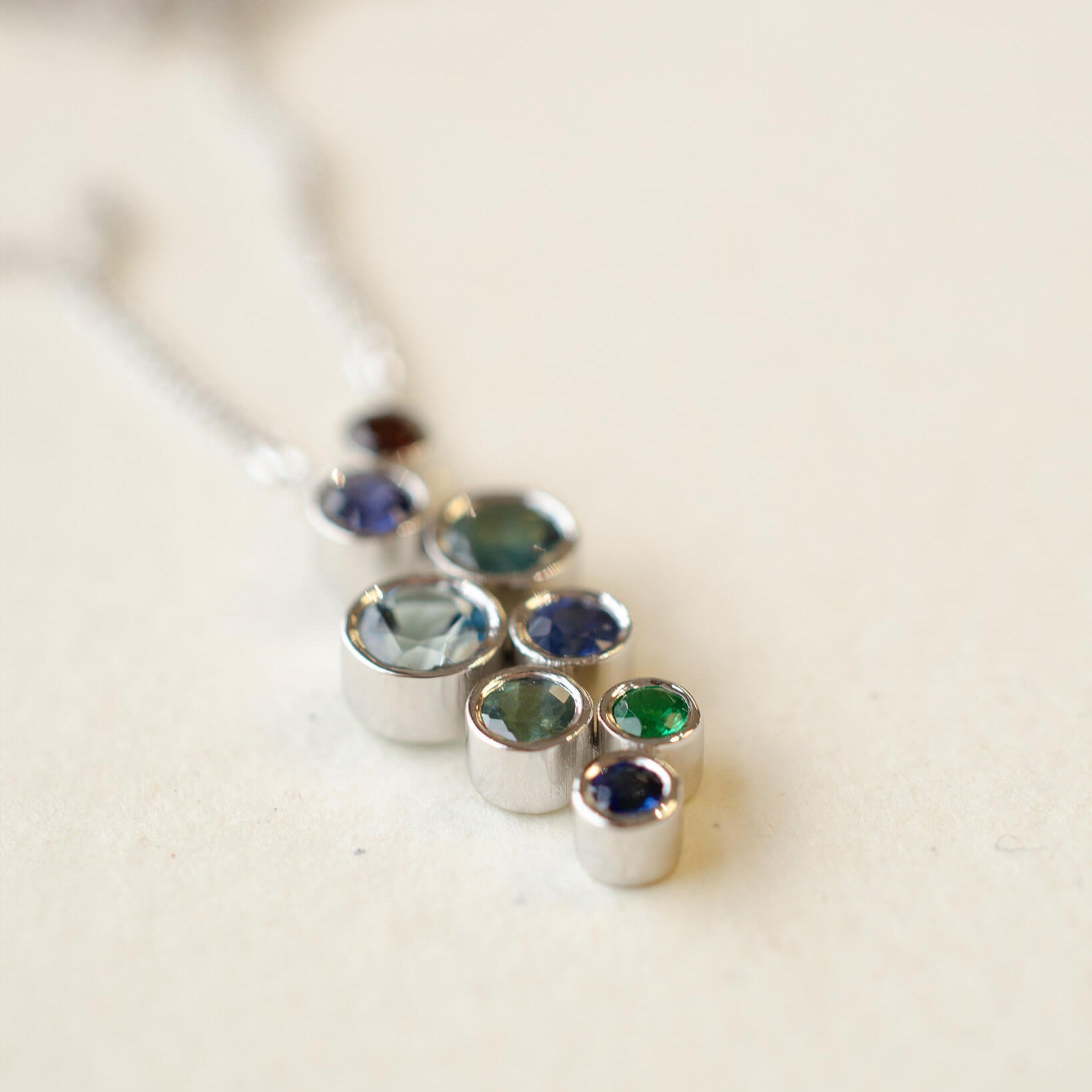 A platinum birthstone bubble necklace