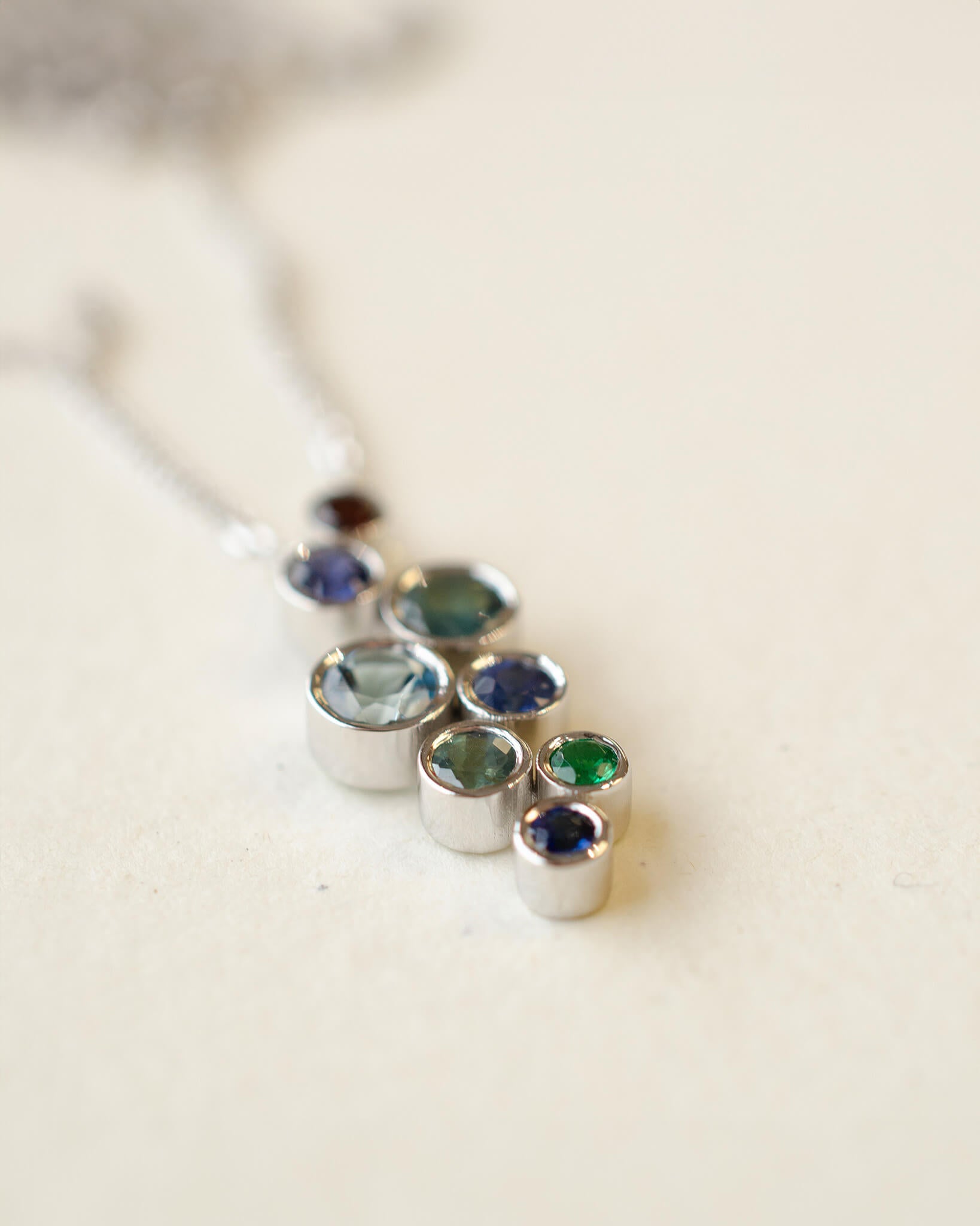 A platinum birthstone bubble necklace