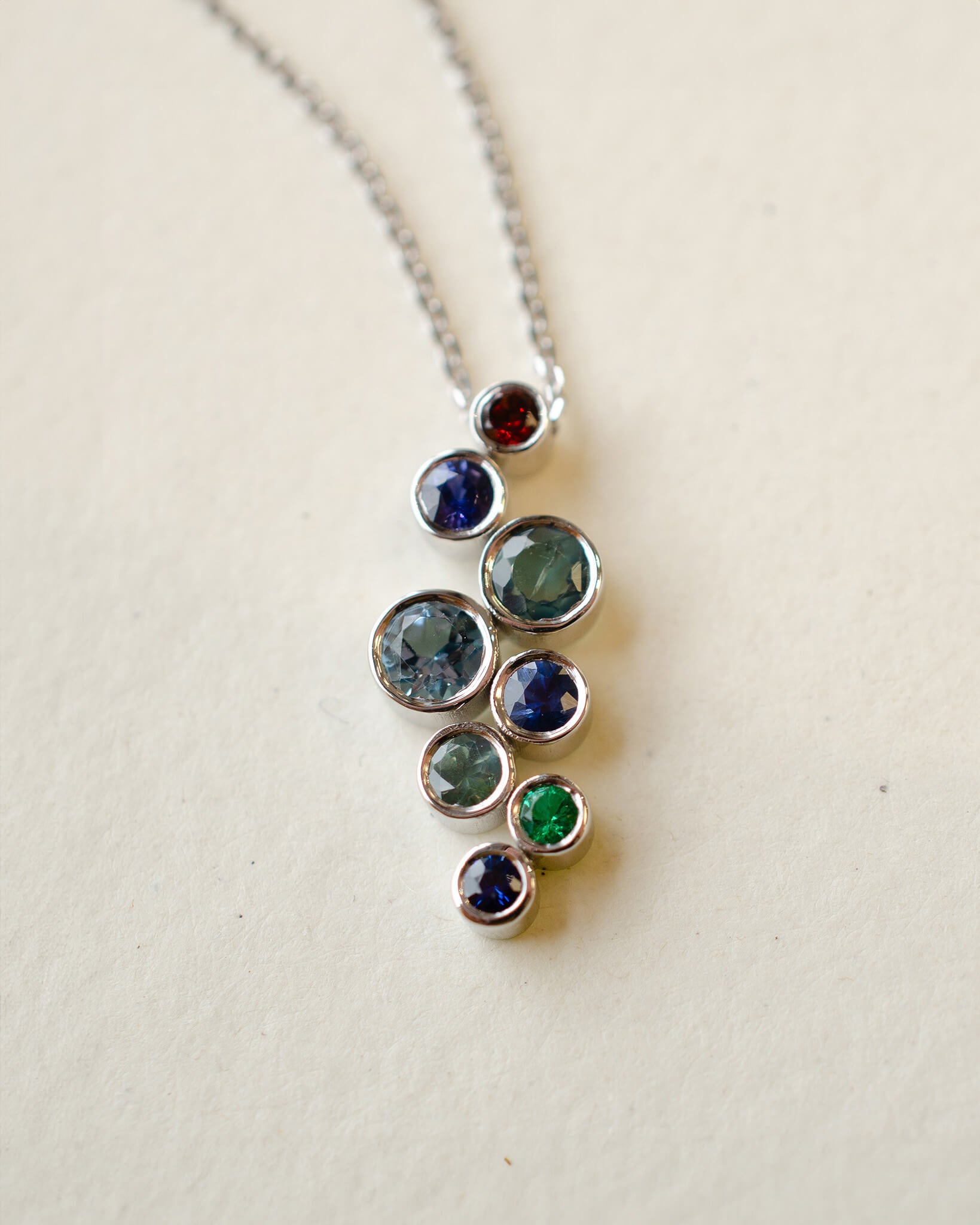 A platinum birthstone bubble necklace