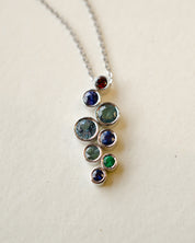 A platinum birthstone bubble necklace
