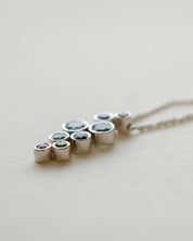 A platinum birthstone bubble necklace