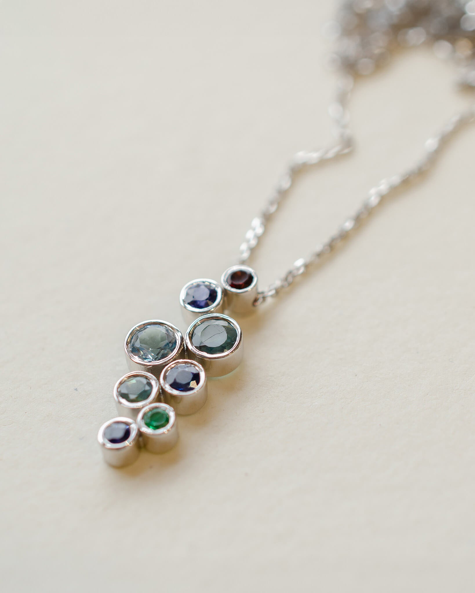 A platinum birthstone bubble necklace