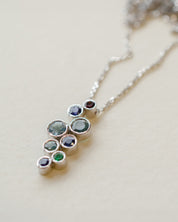 A platinum birthstone bubble necklace