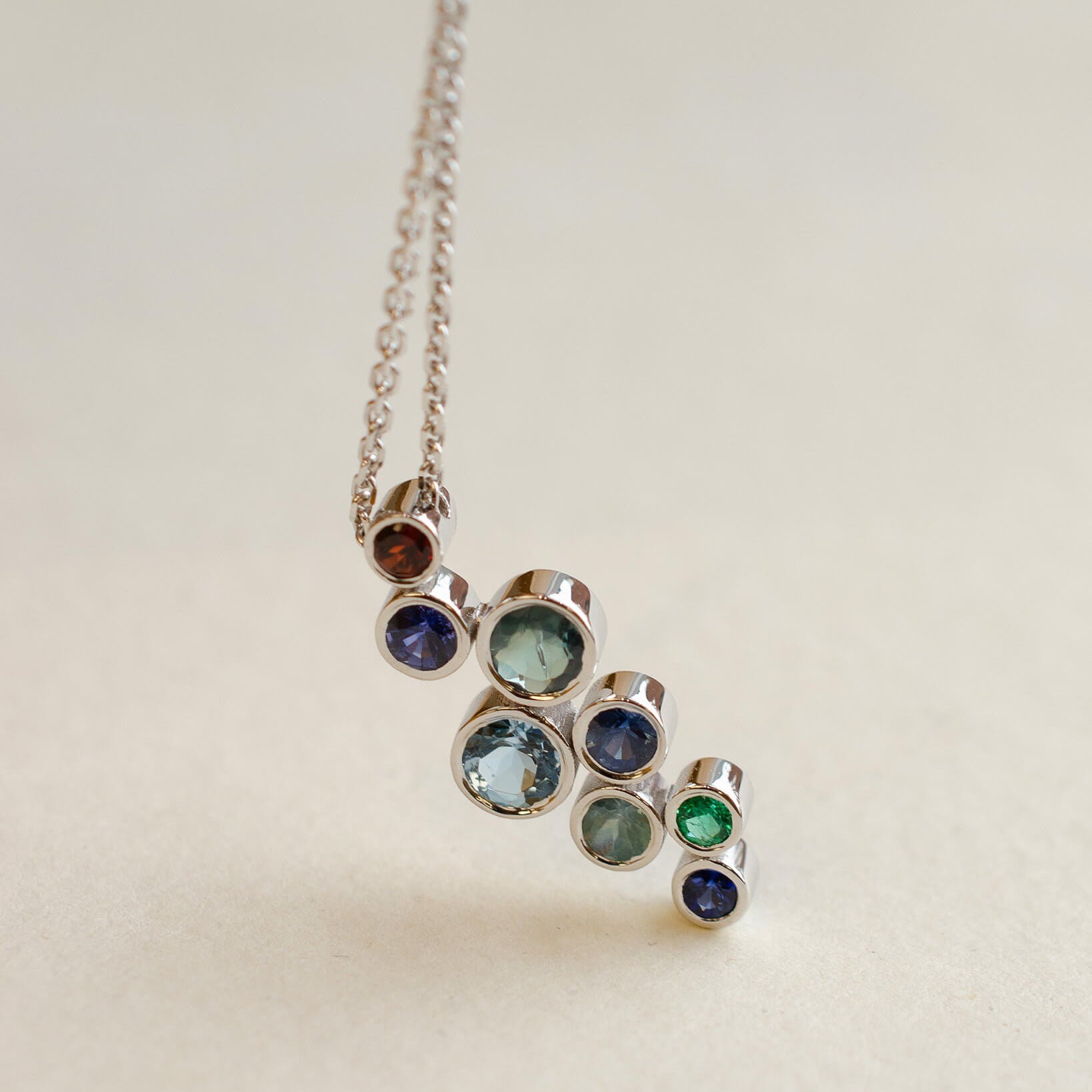 A platinum birthstone bubble necklace