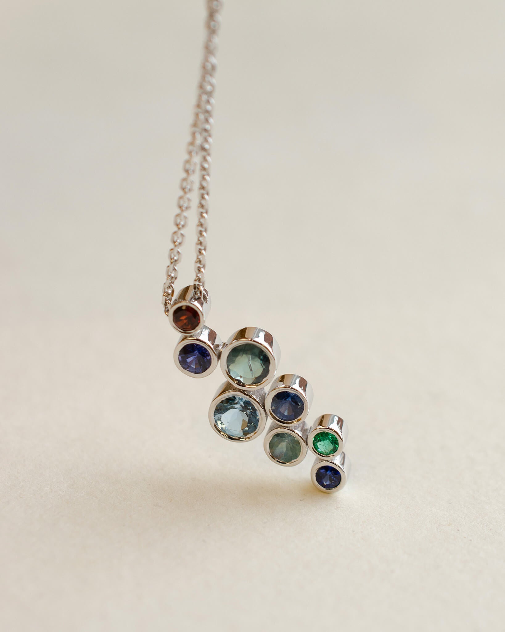 A platinum birthstone bubble necklace