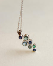 A platinum birthstone bubble necklace